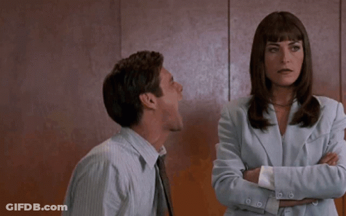 Man Yelling At Crossed Arms Woman GIF