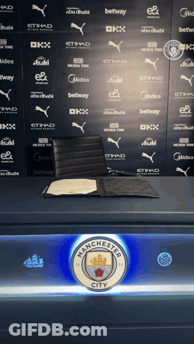 Manchester City Logo On Blue GIF