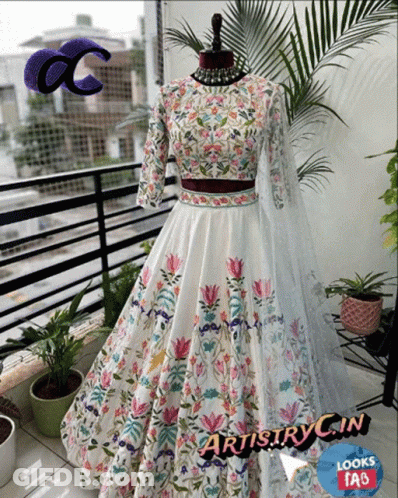 Mannequin In White Dress With Colorful Flowers GIF