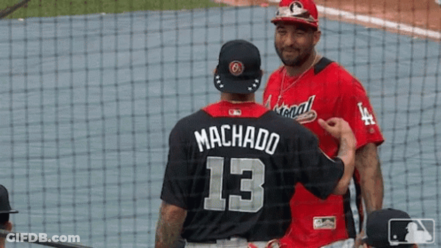 Manny Machado Hugging An Opponent GIF