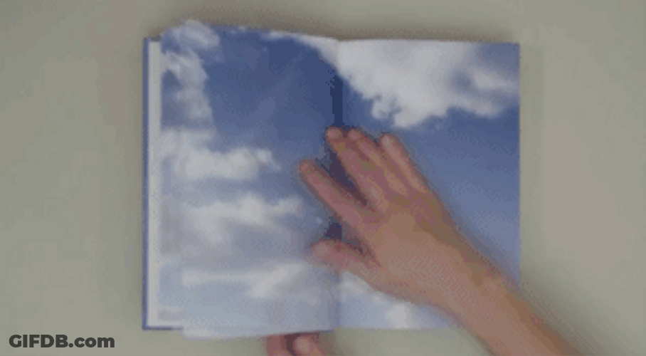 Manual Book Flip Cloud Movement GIF