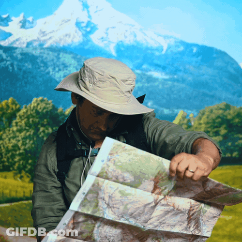 Map Explorer Guy Looking For Directions GIF