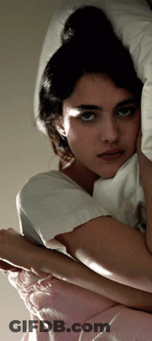 Margaret Qualley Lying In Bed GIF