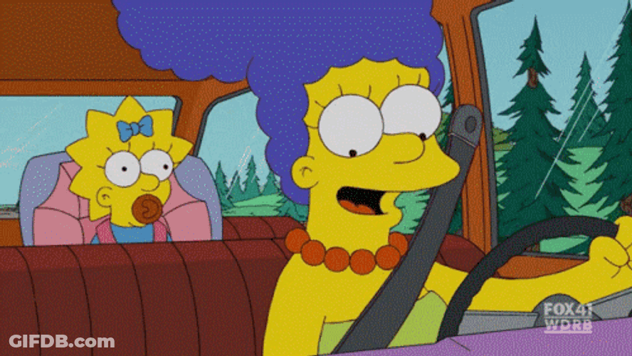 Marge Simpson Loading CD Into Player GIF