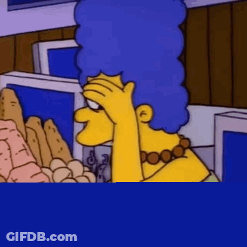 Marge Simpson Sitting At Table With Food GIF