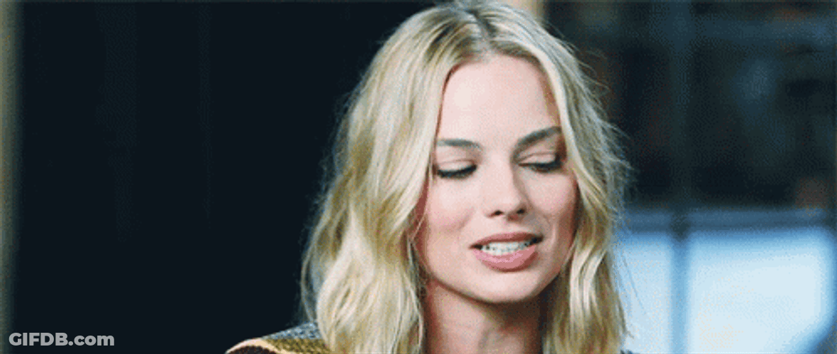 Margot Robbie Interview Coy Reaction GIF