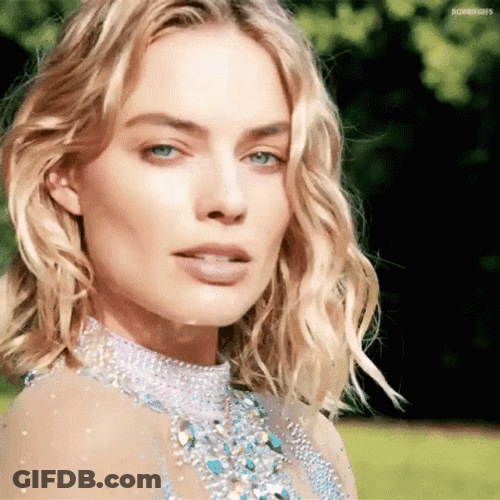 Margot Robbie Intrigued Looking Suspicious GIF