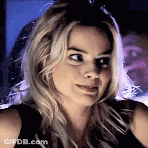 Margot Robbie Shy Stare Down GIF