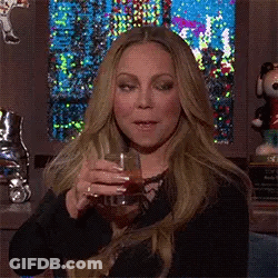 Mariah Carey Holding Glass Of Wine GIF