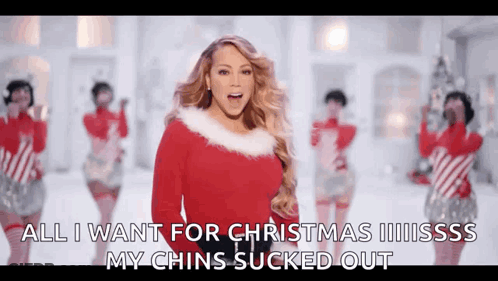 Mariah Carey In Santa Claus Sweater Singing Christmas Song GIF