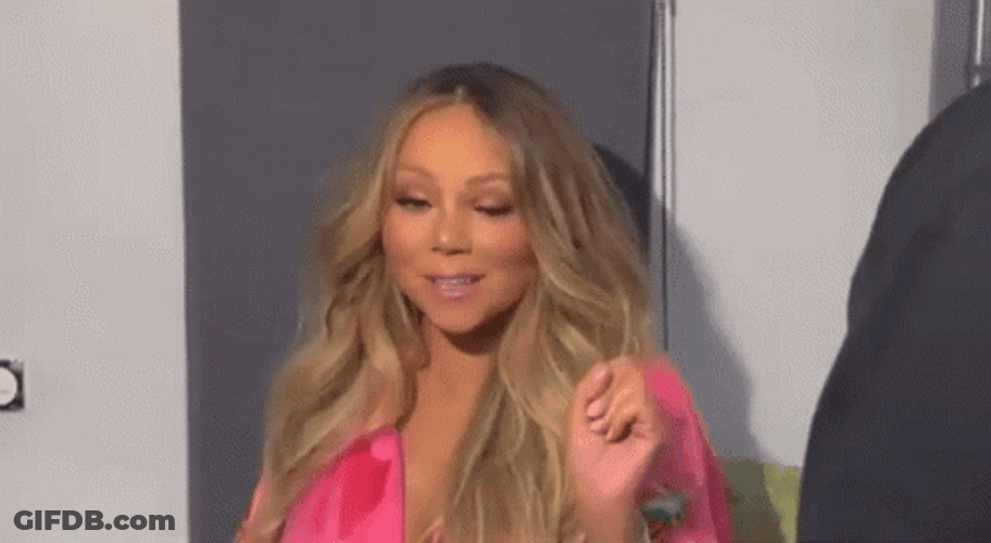 Mariah Carey Shrugging GIF