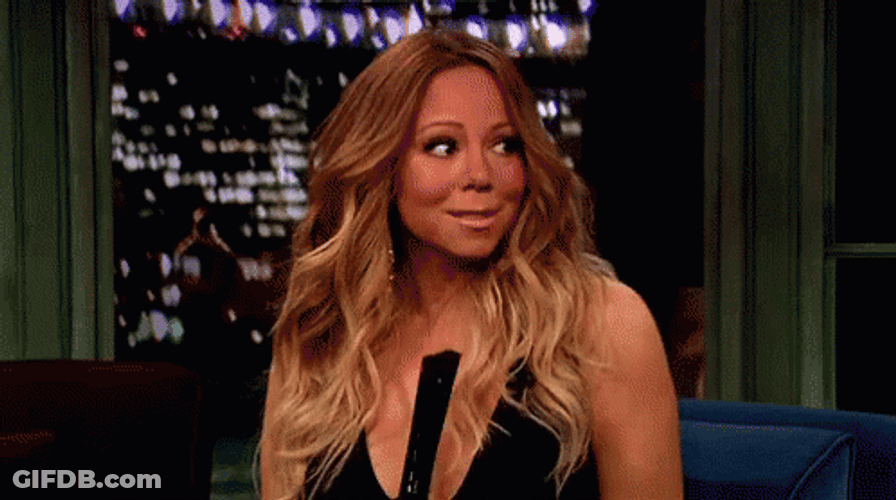 Mariah Carey Shy Shrugging GIF