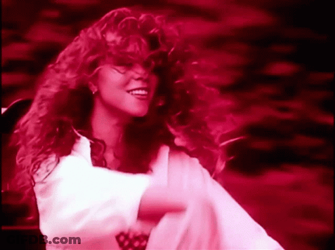 Mariah Carey Wriggling Finger Wave GIF