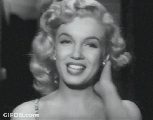 Marilyn Monroe Flipping Her Hair GIF