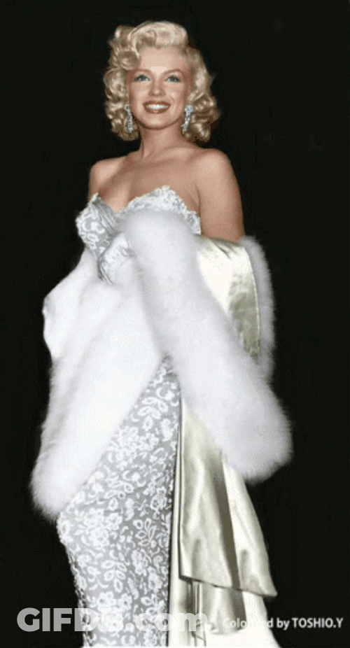 Marilyn Monroe Wearing A White Elegant Gown GIF