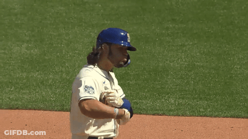 Mariners Baseball Player In Blue Helmet And White Jersey GIF