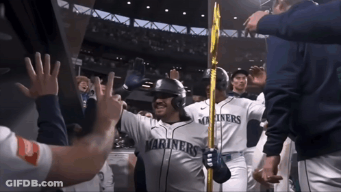 Mariners Player Holding Gold Pole GIF