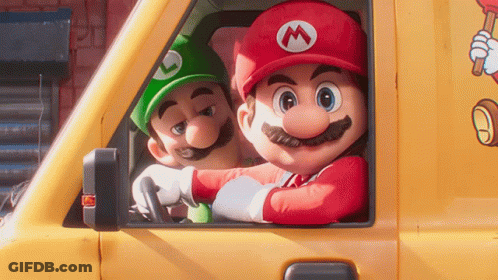 Mario And Luigi Are Driving A Yellow Van With The Letter M On The Side GIF