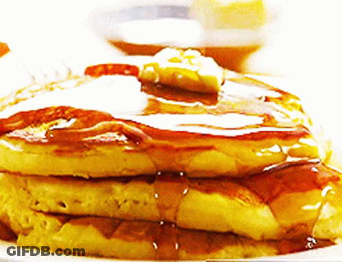 Mario And Slinky Puppet Next To Pancakes With Marshmallows GIF