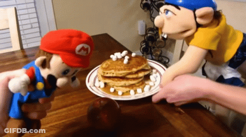 Mario Puppet Reaching For Pancakes GIF