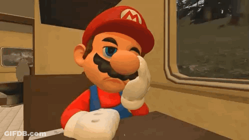 Mario Sitting At Diner Table Holding Donut GIF