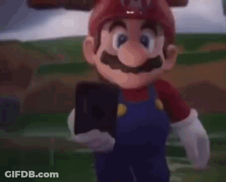 Mario Taking Selfie With Cell Phone GIF