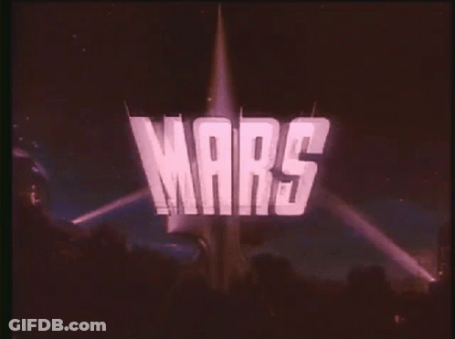 Mars On Screen In Dark Room GIF