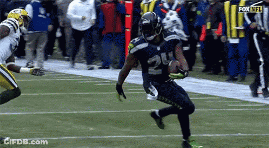 Marshawn Lynch Carrying Ball GIF