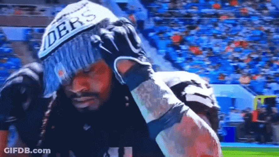 Marshawn Lynch Fixing Bonet GIF
