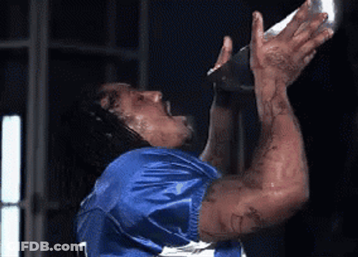 Marshawn Lynch Pouring Food On His Mouth GIF