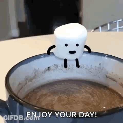 Marshmallow Sitting In Coffee Cup GIF