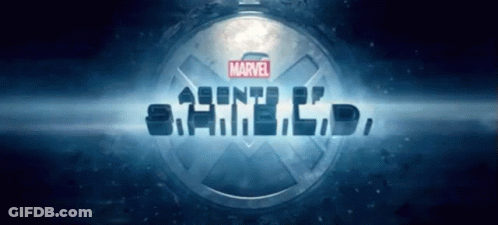 Marvel Shield Logo On Dark Blue Background GIF