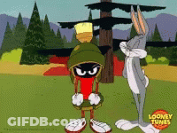 Marvin The Martian And Bugs Bunny From Looney Tunes Are Standing Next To Each Other GIF