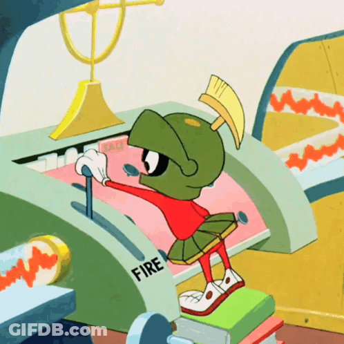 Marvin The Martian Is Pushing A Button That Says Fire On It GIF