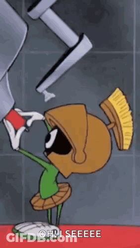 Marvin The Martian Is Standing In Front Of A Machine With A Brush On His Head And Says Oh ! I Seeee GIF