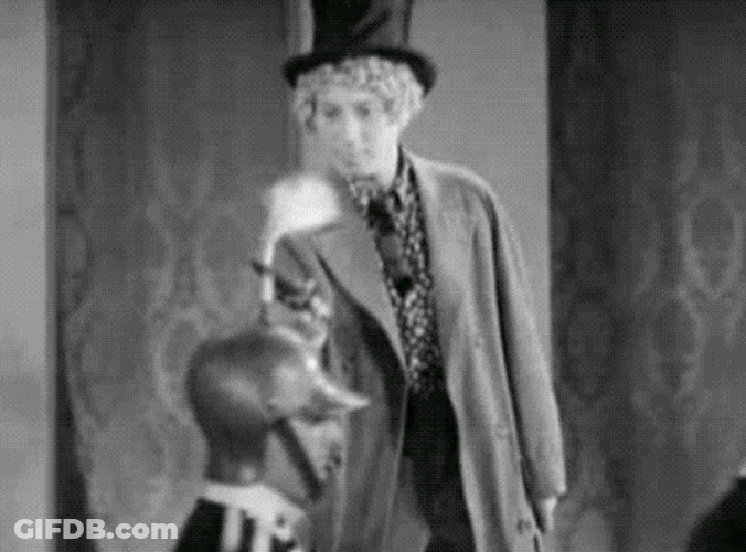 Marx Brothers Harpo Cutting Hats GIF