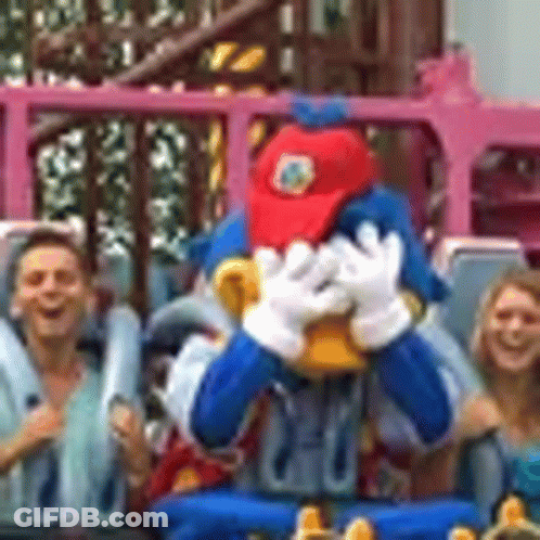 Mascot Covering Face During Roller Coaster Ride GIF