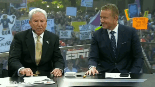 Mascot Dancing In Stadium With Letter S GIF