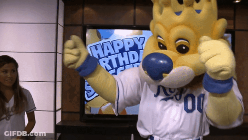 Mascot Giving Thumbs Up In Front Of TV Saying Happy Birthday GIF