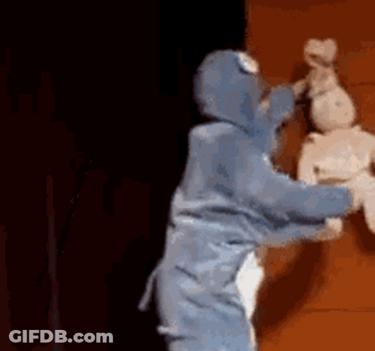 Mascot Guy Punching Toy GIF