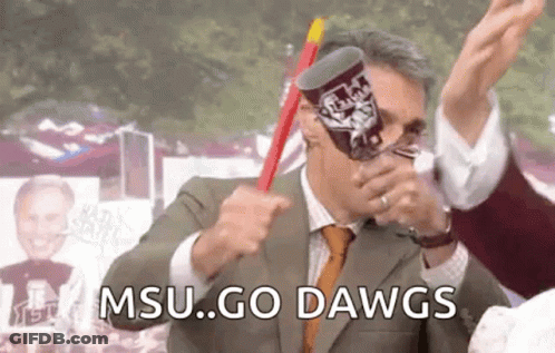 Mascot Holding Flag Saying Dags Min GIF
