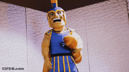 Mascot In Blue And Yellow Outfit And Helmet GIF