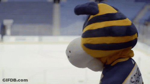 Mascot In Blue And Yellow Striped Hat And Capitol Jersey GIF