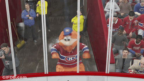 Mascot In Canadiens Jersey In Front Of Crowd GIF