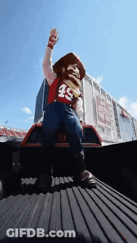 Mascot In Cowboy Costume With Number 49 GIF