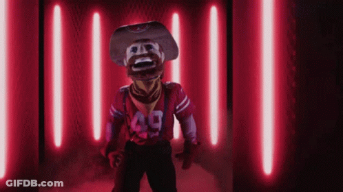 Mascot In Cowboy Hat And Number 49 Jersey GIF