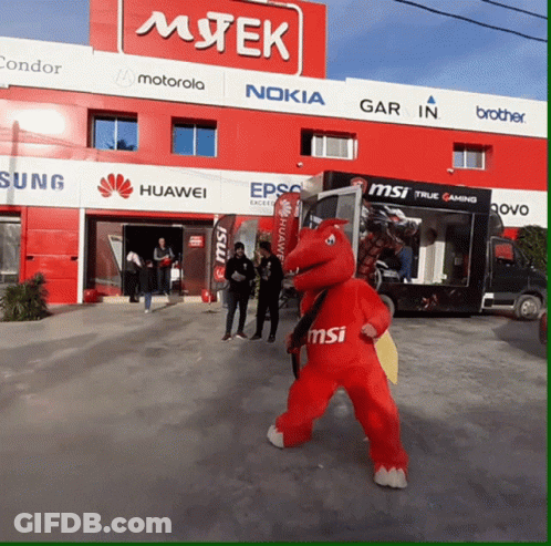 Mascot In Front Of Mtek Store GIF