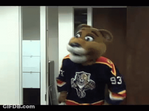 Mascot In Jersey Number 93 Standing In Doorway GIF