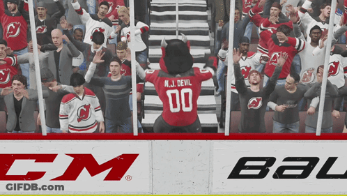 Mascot In N.J. Devil Jersey In Front Of Crowd GIF