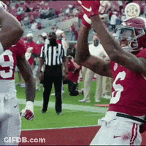 Mascot In Red Shirt With Letter N Looking Up GIF